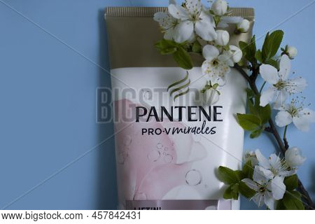 April 16, 2022 Ukraine City Kyiv Pantene Pro-v Hair Balm, Cherry Flower On A Light Background
