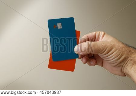 Green And Orange Credit Or Debit Contactless Cards With Contact Less Sign. Digital Payment System.