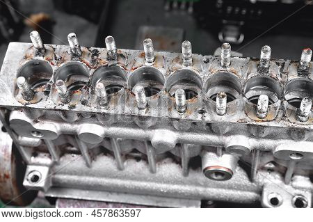 Car Fuel Pump Repair, Auto Fuel Pump Disassembly For Repair, Old Car Fuel Pump On A Workbench, Disas
