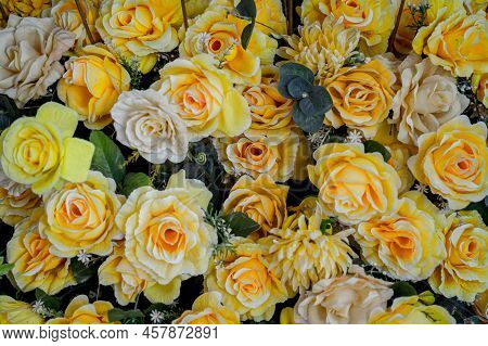 Big Bouquet Of Flowers In A Vase On A Gray Wall Background