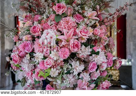 Big Bouquet Of Flowers In A Vase On A Gray Wall Background