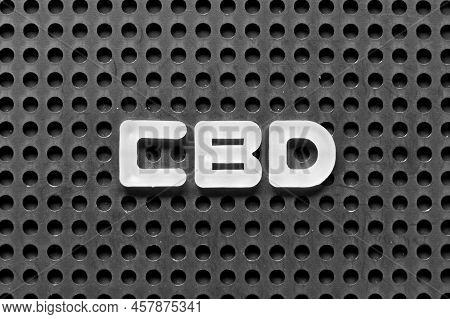 White Alphabet Letter In Word Cbd (abbreviation Of Central Business District Or 
Cannabidiol) On Bla
