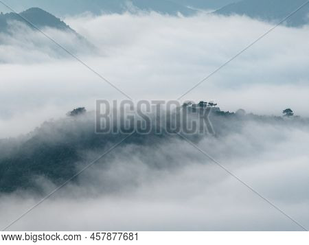 Historic Takeda Castle Ruins On Mountaintop In Heavy Fog