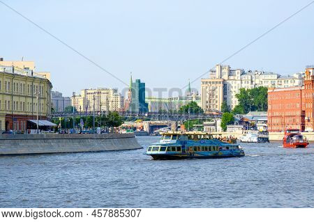 Moscow. Russia. June 26, 2021. Pleasure Boats Sail Along The Moscow River Against The Backdrop Of Th
