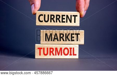 Current Market Turmoil Symbol. Concept Words Current Market Turmoil On Wooden Blocks On A Beautiful 