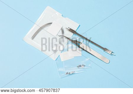 A Set Of Special Tools For An Orthodontist To Install Braces For A Patient. Orthodontic Arcs, Ligatu