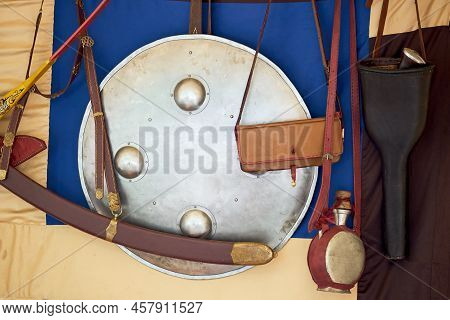 Vintage Bow, Arrows In A Quiver And A Retro Shild On The Background Of The Swedish Flag. Ancient Mil