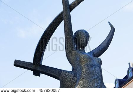 Vaasa, Finland - June 20, 2022: Statue Depicting Woman Stretching Out Her Hands Towards The Sky