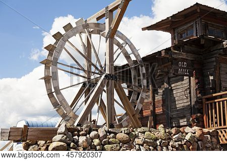 Harma, Finland - June 21, 2022: An Old Mill With A Large Water Wheel
