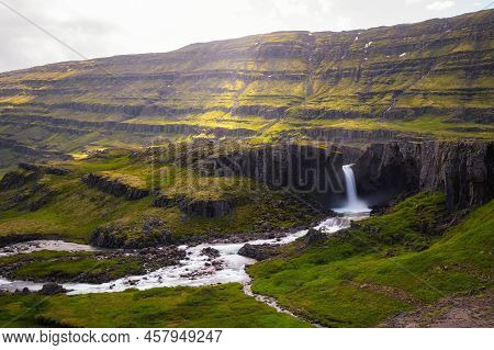 Aerial View Of The Folaldafoss Waterfall In Berufjardara River Located In The East Of Iceland. Long 