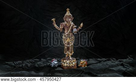 Bronze Figurine Of Lord Ganesha And Mushika Statue Mouse (rat Of Lord Ganesha Amulet). Ganesha Is Hi