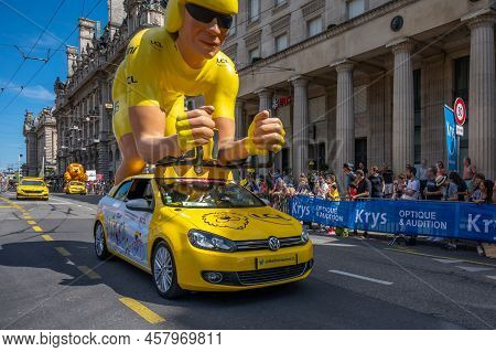Lausanne, Vaud Canton, Switzerland -09.07.2022: Passage Of An Advertising Car Of Yellow Jersey Lcl I