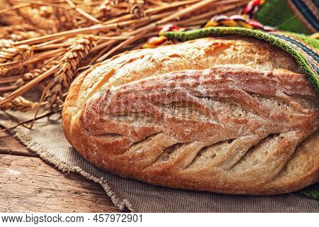 Fresh Oven Baked Homemade Sourdough Bread In Folklore Bag. Bulgarian Traditions And Symbol Of Farmla