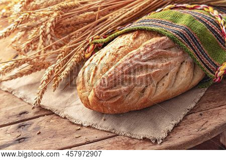 Fresh Oven Baked Homemade Sourdough Bread In Folklore Bag. Bulgarian Traditions And Symbol Of Farmla
