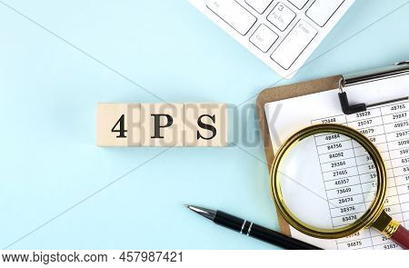 4ps Word On Wooden Cubes On A Blue Background With Chart And Keyboard