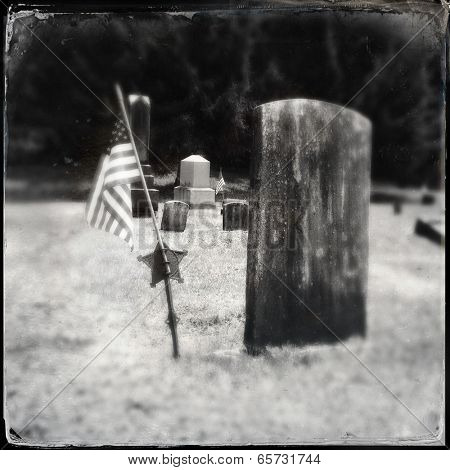 Instagram filtered style image of a Civil War era grave and American Flag