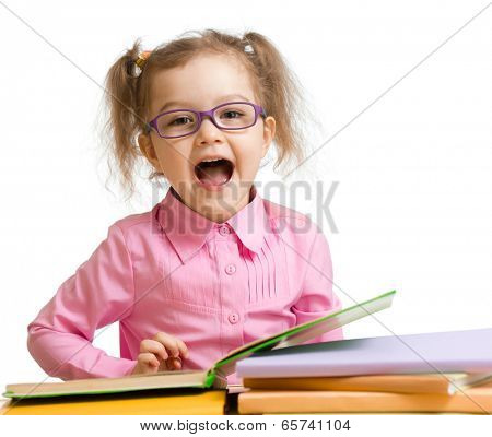 Funny kid girl in glasses with books speaking something isolated on white