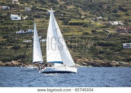 AEGEAN SEA, GREECE - APR 29, 2014: Unidentified sailboats participate in sailing regatta 