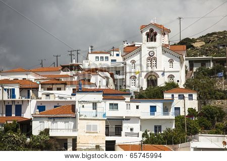 ANDROS, GREECE - APR 28, 2014: Marina of Andros, is the northernmost island of the Greek Cyclades archipelago in the Aegean Sea - area is 380 km2, 40 km long, and its greatest breadth is 16 km.