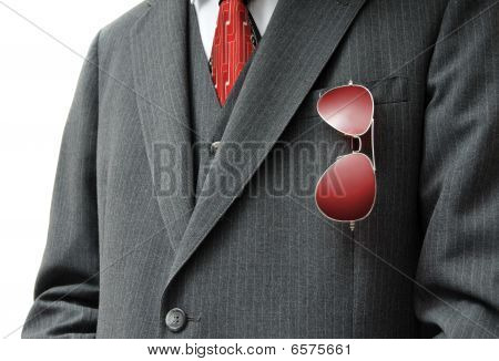 Pair Of Red Aviators In Businessman's Pocket
