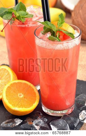 Fruit punch cocktail drinks and fruits.