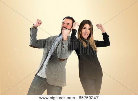 Couple Winner Over Ocher Background