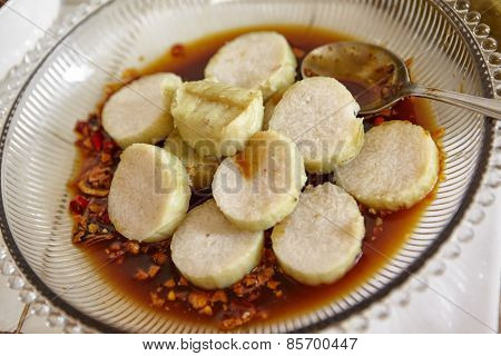 Lontong mie in Indonesian for its famous traditional food, or in English maybe spelled rice cake and noodle in vegetable soup