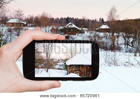 Tourist Photographs Of Snowy Wooden Houses
