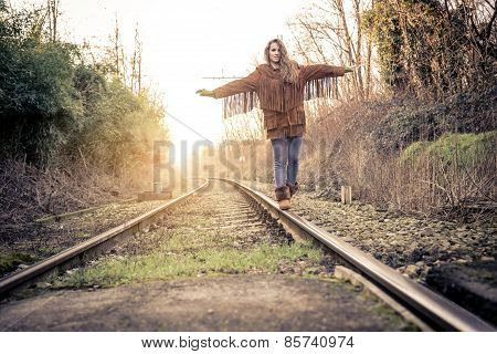 Woman Walking On Rail