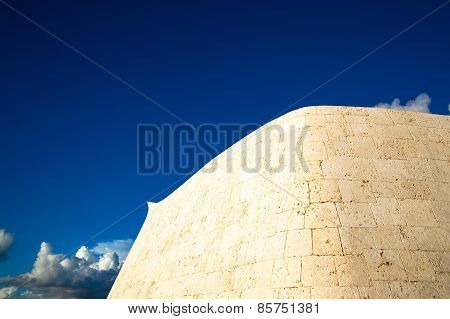 Smooth curve rampart and blue sky in Okinawa