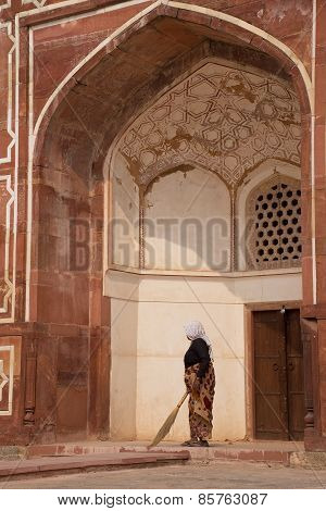 Indian Woman Sweeping Floor Of Humayun's Tomb, Delhi, India