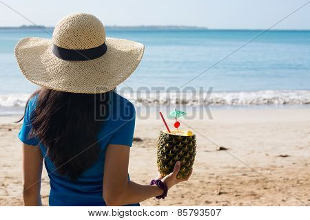 Woman Enjoying Pineapple Drink On Sunny Day