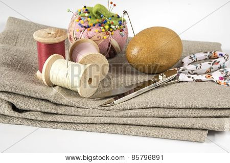 Sewing accessories on white