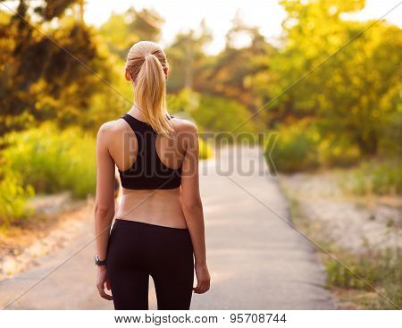 Sport Girl Standing With Her Back