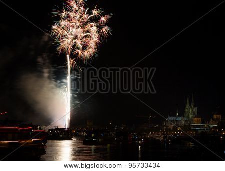 Colourful Firework In Front Of The Cathedral Of Cologne
