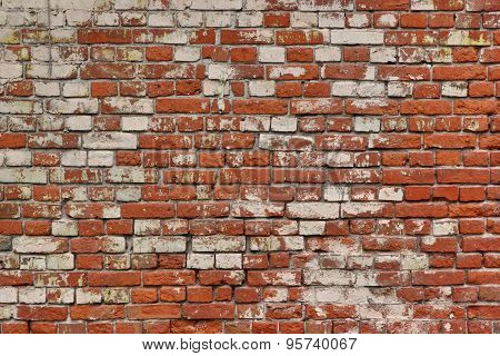 Broken Old Bricklaying From Red White Bricks And Damaged Plaster