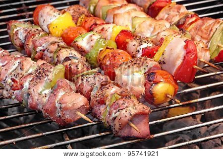 Assorted Roasted Meat With Vegetable On Barbecue Flaming Grill