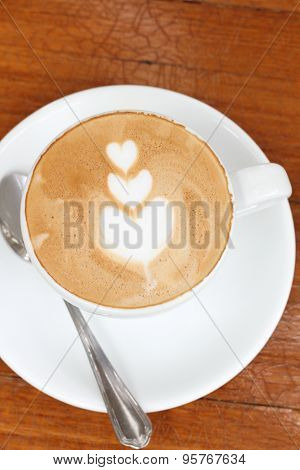 Cup of cappuccino coffee