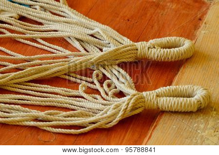 Ropes with loops on brown background