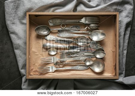 Set of silverware in wooden box