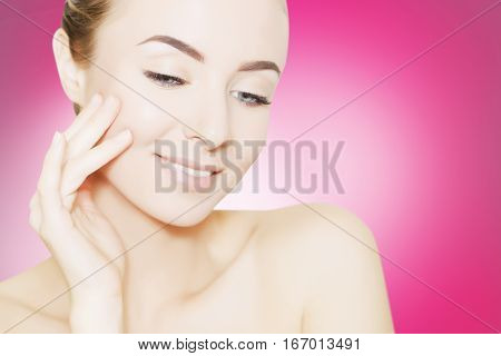 portrait of beautiful smiling woman with perfect skin