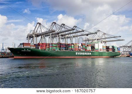 ROTTERDAM NETHERLANDS - MAR 16 2016: Container ship Ever Lyric from Evergreen moored at the ECT container terminal in the Port of Rotterdam.
