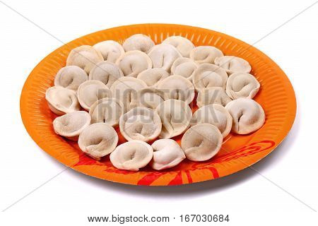 Frozen Pelmeni Laying On The Orange Plate