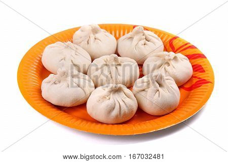 Frozen Manti Laying On The Orange Plate