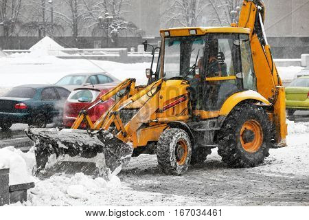 Snow plow outdoors cleaning street