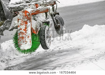 Snow plow outdoors cleaning street