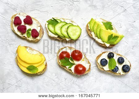 Assortment Of Fruit And Vegetable Toasts.top View.
