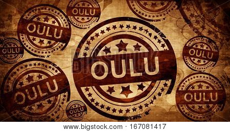 Oulu, vintage stamp on paper background