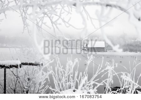 frozen lake boathouse winter cabin traditional alpine life