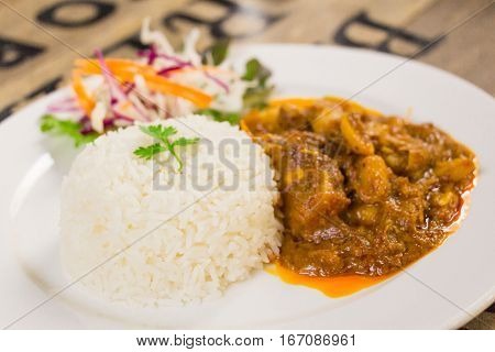 thai food gaeng hang lay. pork curry with rice